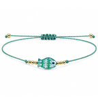 Pulsera de Hilo con Pez de Cristal y Ojo Turco – vista principal del diseño hilo con pez de cristal y ojo turco