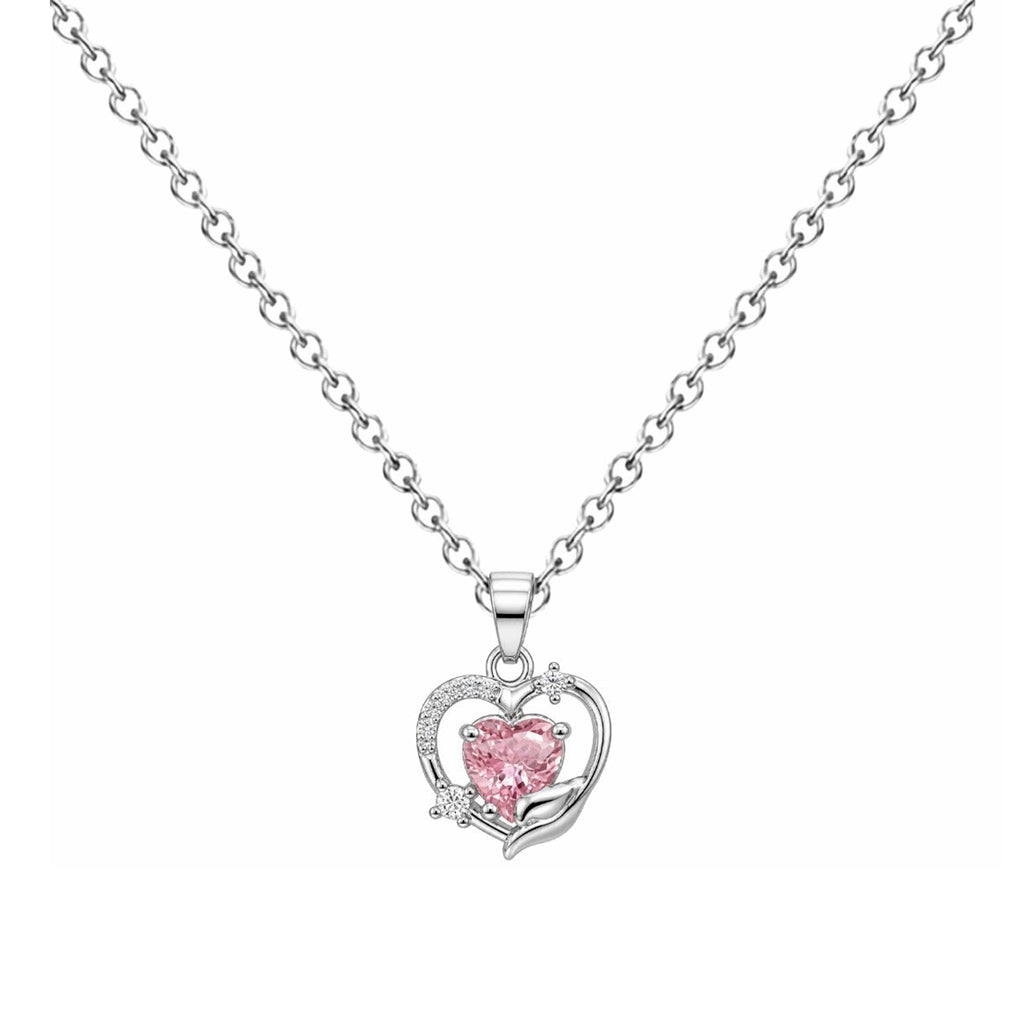 Collar de corazón rosa con doble contorno, detalle del colgante sobre fondo blanco.