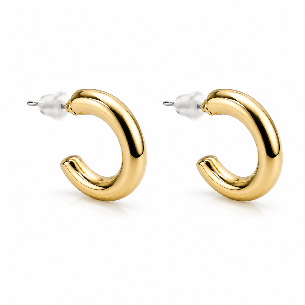 Mini Aros Ovalados Dorados — par de pendientes sobre fondo blanco