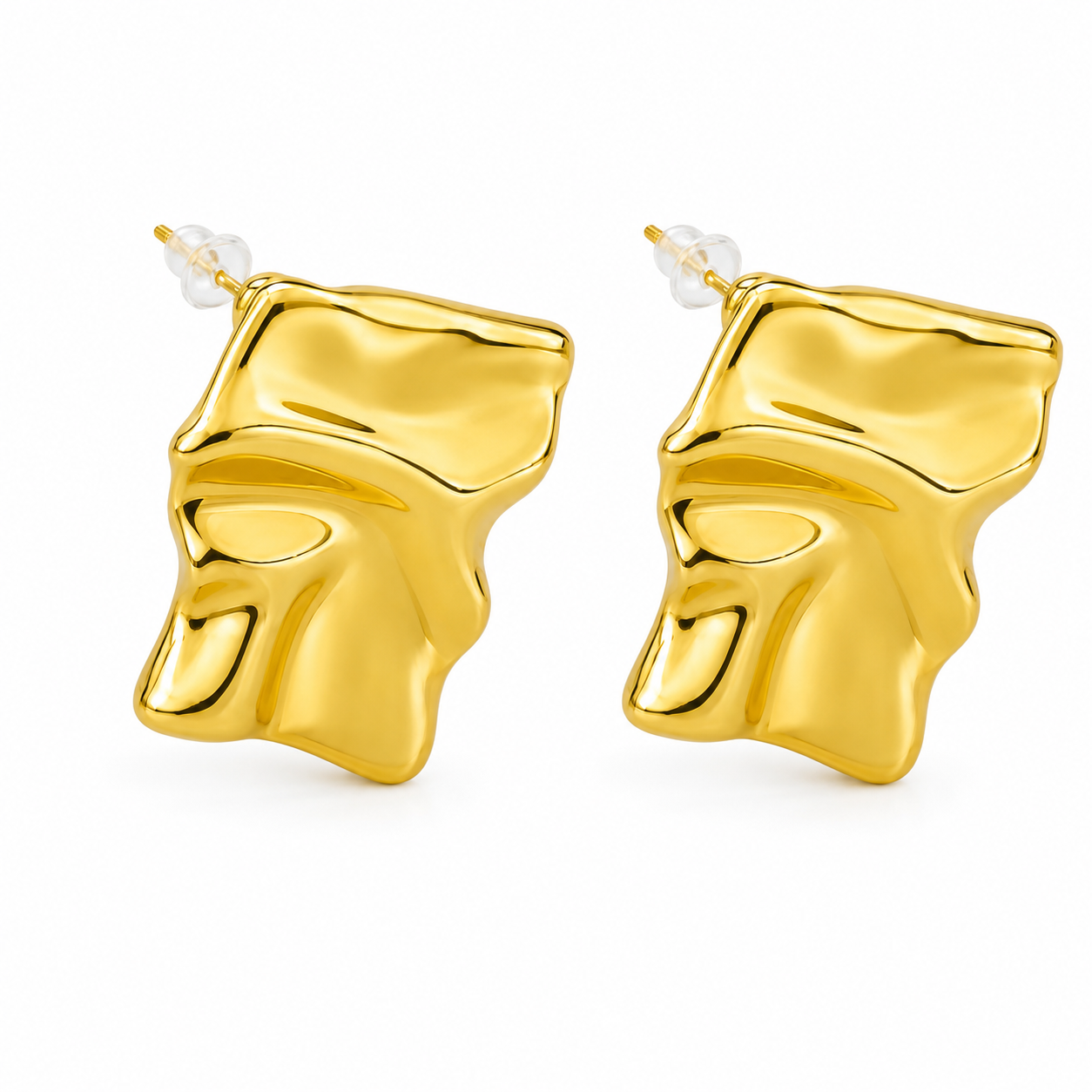 Pendientes Rostro Escultural Dorados — par de pendientes sobre fondo blanco