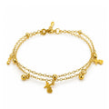 Pulsera doble con charms de mariposa en acero inoxidable dorado