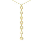 Collar largo de acero inoxidable dorado con los siete símbolos de los chakras calados en diseño vertical elegante.