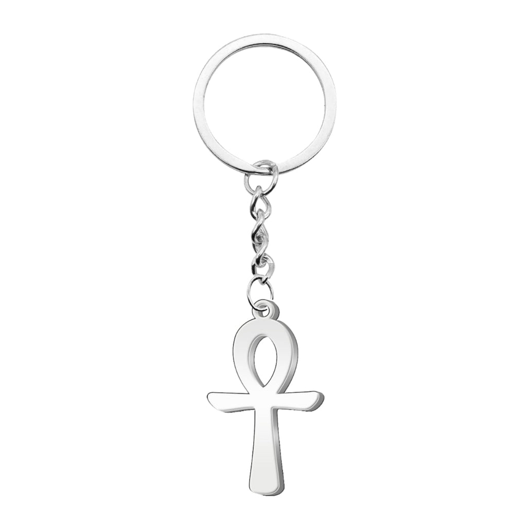 Llavero de metal con colgante de la Cruz Egipcia (Ankh) fabricado en acero inoxidable de color plateado, unido a una argolla circular mediante una cadena de eslabones corta.