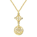 Collar con colgante de diseño calado en acero dorado: fusión de Nudo de Bruja y Tetragrammatón. Joyería esotérica fina.