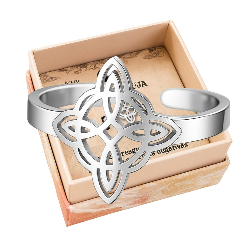 Anillo abierto de acero plateado con el símbolo geométrico del Nudo de Bruja, sin luna.
