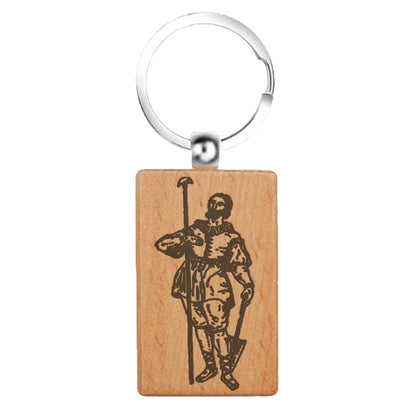 Llavero rectangular de madera natural con grabado láser de San Isidro Labrador. Diseño rústico y ligero, ideal para agricultores y devotos del patrón de Madrid.
