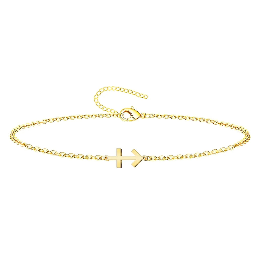 Pulsera de cadena fina dorada de acero inoxidable con amuleto de Cruz contra el Mal y cierre de mosquetón.