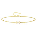 Pulsera de cadena fina dorada de acero inoxidable con amuleto de Cruz contra el Mal y cierre de mosquetón.