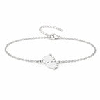 Pulsera Huella de Pie en Acero Inoxidable sobre fondo blanco