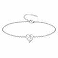 Pulsera con Corazón y Ojo Turco en Acero Inoxidable - Plateado sobre fondo blanco