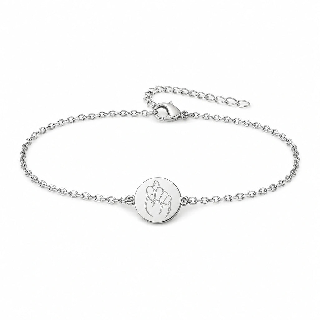 Pulsera Higa en Acero Inoxidable - Plateado sobre fondo blanco