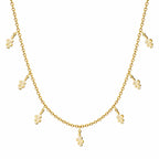 Collar con 7 Colgantes de Serpiente en Acero Inoxidable - Dorado sobre fondo blanco