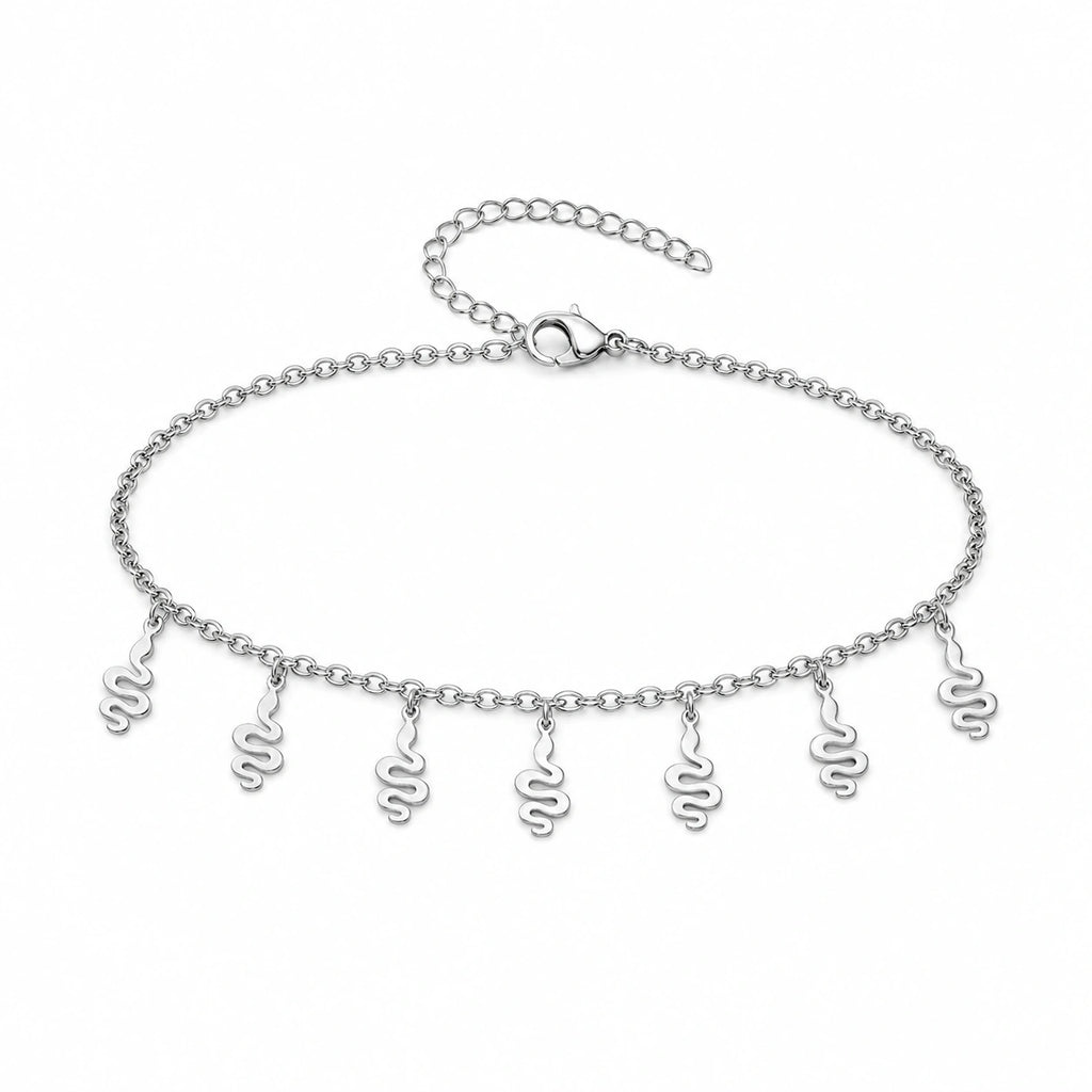 Pulsera con 7 Colgantes de Serpiente en Acero Inoxidable sobre fondo blanco