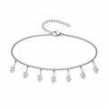 Pulsera con 7 Colgantes de Serpiente en Acero Inoxidable sobre fondo blanco