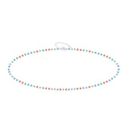 Pulsera de Cristales Azul Claro y Coral en Acero Inoxidable sobre fondo blanco
