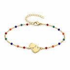 Pulsera Multicolor con Huella de Pie en Acero Inoxidable sobre fondo blanco