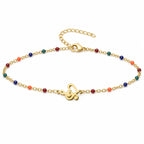 Pulsera Multicolor con Nota Musical en Acero Inoxidable sobre fondo blanco