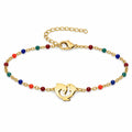 Pulsera Multicolor con Delfín en Acero Inoxidable sobre fondo blanco