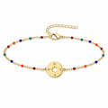Pulsera Multicolor con Brújula en Acero Inoxidable sobre fondo blanco