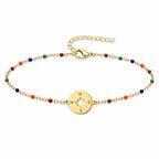 Pulsera Multicolor con Brújula en Acero Inoxidable sobre fondo blanco