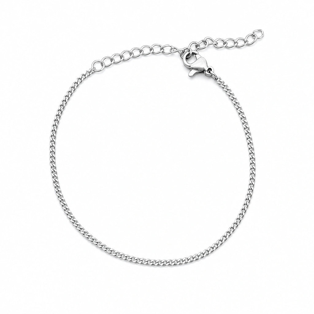 Pulsera de Cadena Eslabón Fino de 1 mm en Acero Inoxidable - Plateado sobre fondo blanco