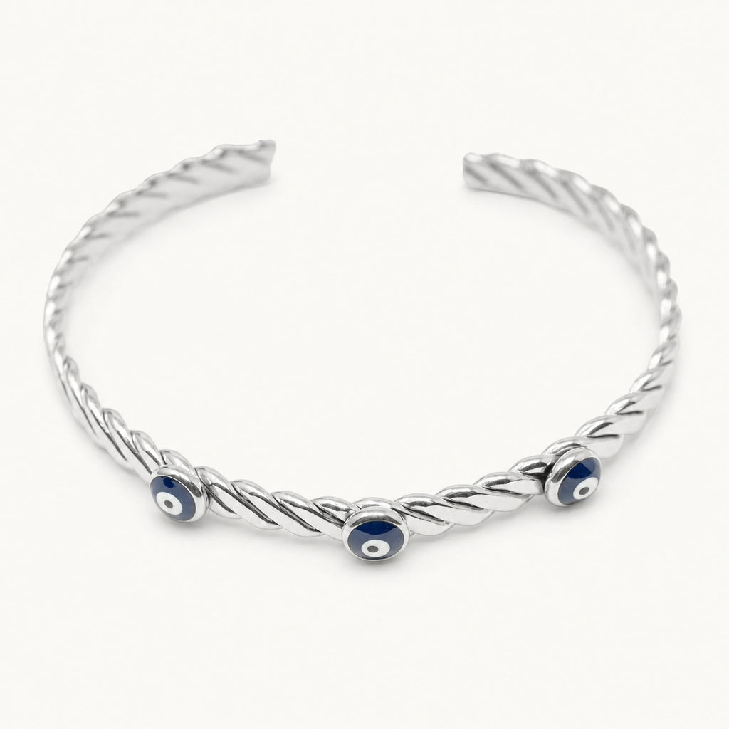 Brazalete Trenzado con Ojos Turcos en Acero Inoxidable - Plateado sobre fondo blanco
