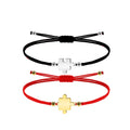 Pulsera de Hilo Encerado con Piezas de Rompecabezas en Acero Inoxidable sobre fondo blanco
