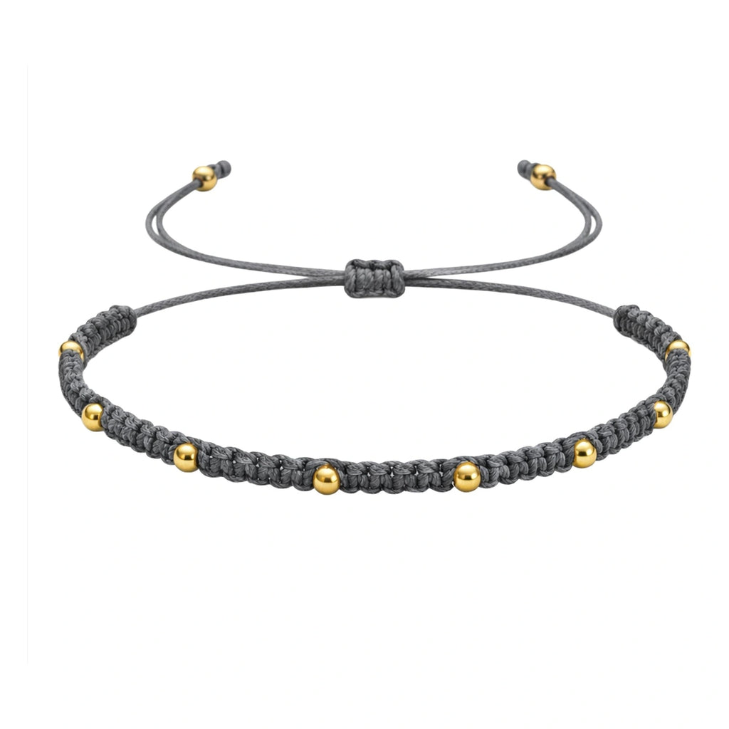 Pulsera de Hilo Encerado con Cuentas de Acero Inoxidable - Gris sobre fondo blanco
