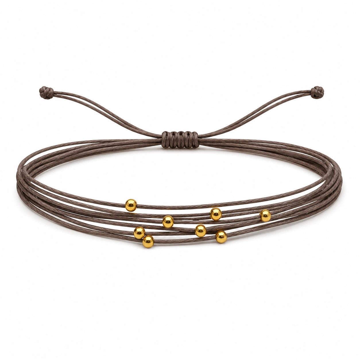 Pulsera Multihilo Encerado con Cuentas de Acero Inoxidable - Marrón sobre fondo blanco