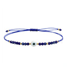 Pulsera de Hilo con Cuentas y Ojo Turco - Azul Marino sobre fondo blanco