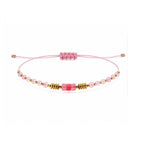 Pulsera de Piedras Naturales con Cuenta Tubular - Rosa sobre fondo blanco
