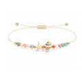 Pulsera de Piedras Naturales con Estrella de Mar y Concha sobre fondo blanco