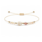 Pulsera de Piedras Naturales con Concha sobre fondo blanco