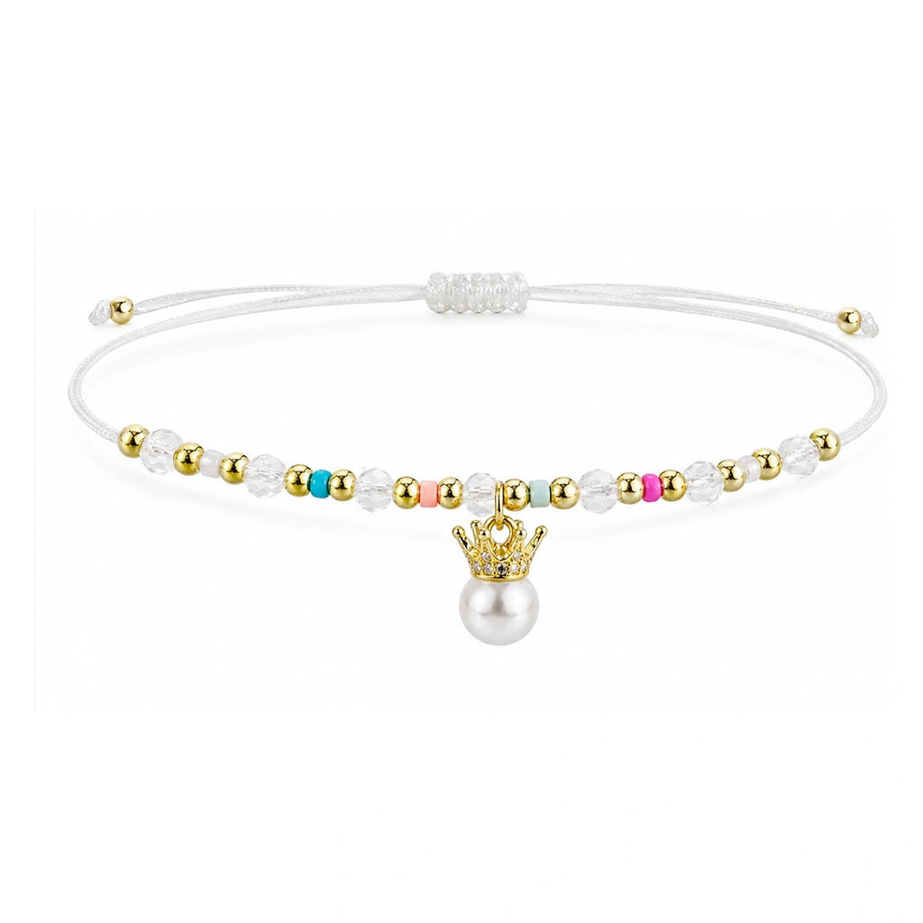 Pulsera de Cristales con Perla y Corona sobre fondo blanco
