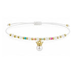 Pulsera de Cristales con Perla y Corona sobre fondo blanco