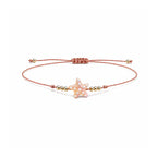 Pulsera de Hilo con Estrella de Mar sobre fondo blanco