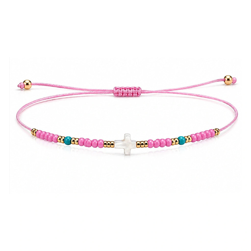 Pulsera de Cuentas con Cruz de Nácar sobre fondo blanco