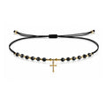 Pulsera de Cristales con Cruz sobre fondo blanco