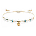 Pulsera de Cuentas con Concha sobre fondo blanco