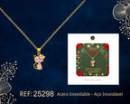 Collar dorado de gato rosa junto a su tarjeta de regalo, sobre fondo oscuro.