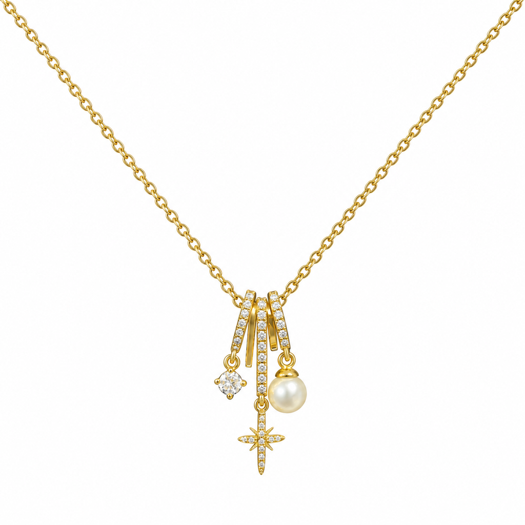 Collar dorado con piedra redonda, estrella y perla sobre fondo blanco