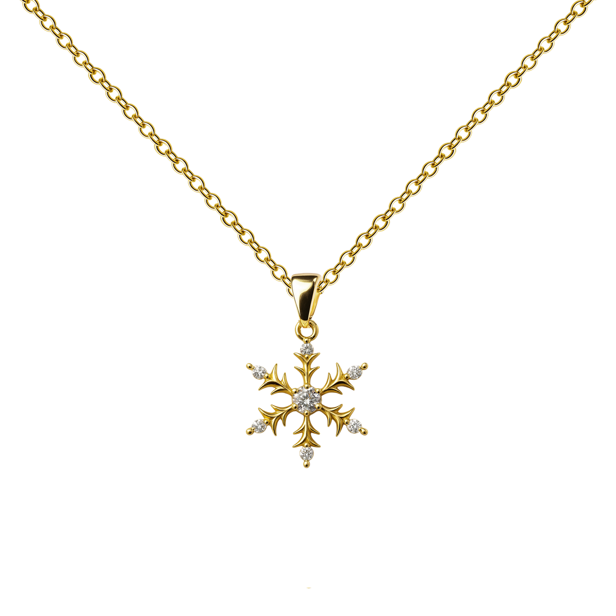 Collar dorado de copo de nieve, con detalles claros, sobre fondo blanco.