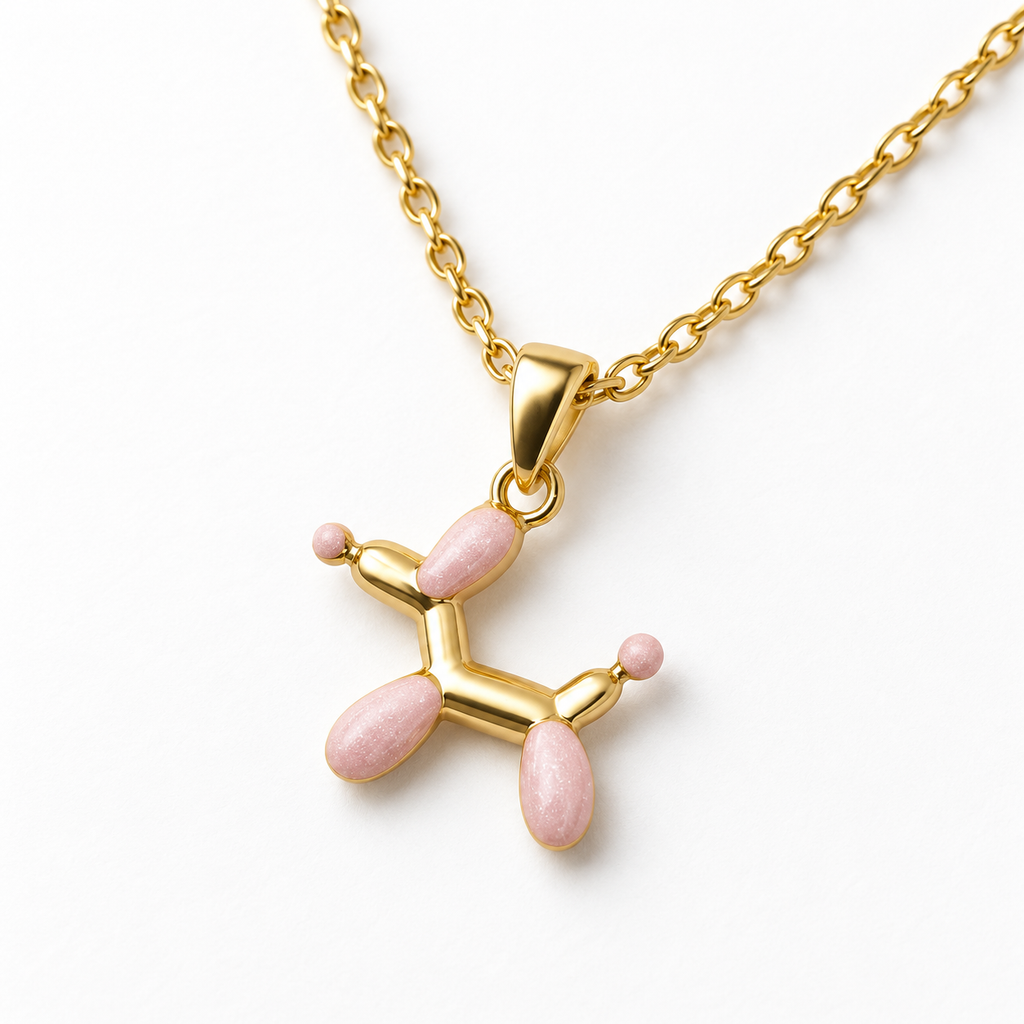 Collar de perro de globoflexia, detalle sobre una superficie blanca.