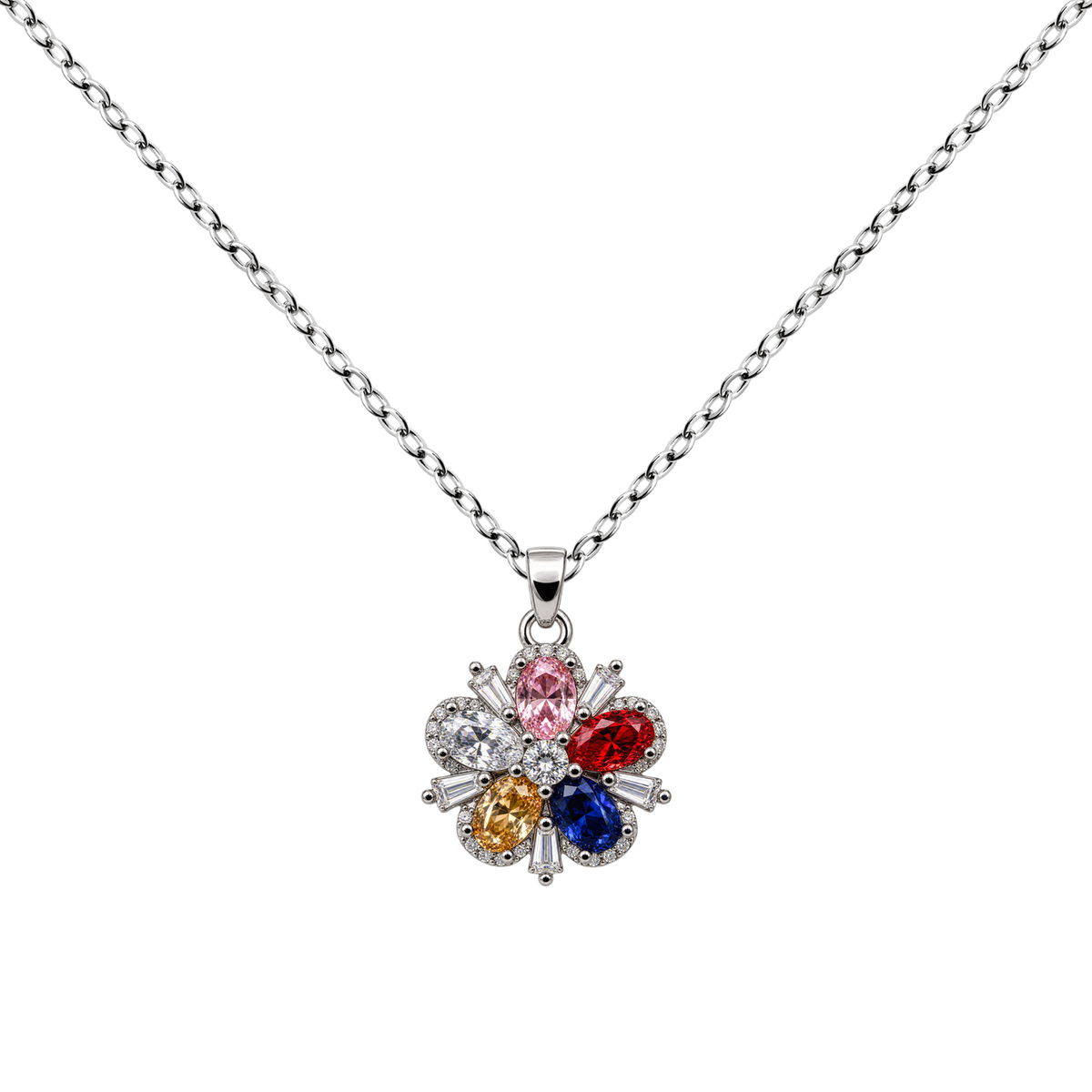 Collar de flor multicolor con circonitas, con pétalos de distintos colores, sobre fondo blanco.