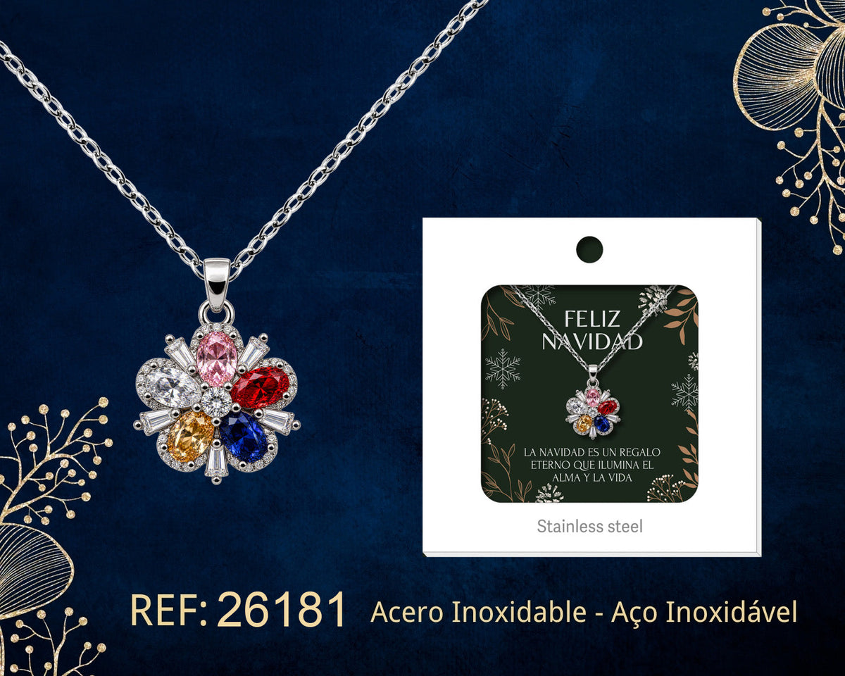 Collar de flor multicolor con circonitas junto a su tarjeta de regalo, sobre fondo oscuro.
