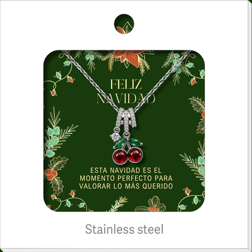 Collar de cerezas rojas, presentado en tarjeta navideña.