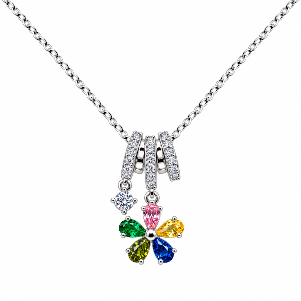 Collar de flor con circonitas de colores, vista frontal sobre fondo blanco.