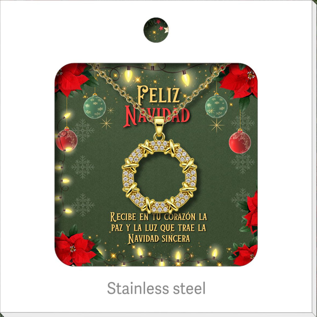 Collar de círculo dorado con circonitas, presentado en tarjeta navideña.
