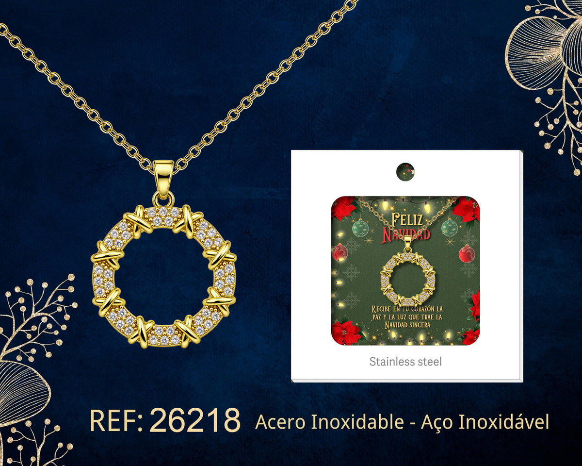 Collar de círculo dorado con circonitas junto a su tarjeta de regalo, sobre fondo oscuro.
