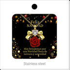 Red Rose and Gold Tone Bow Necklace, presented on a Christmas message card.